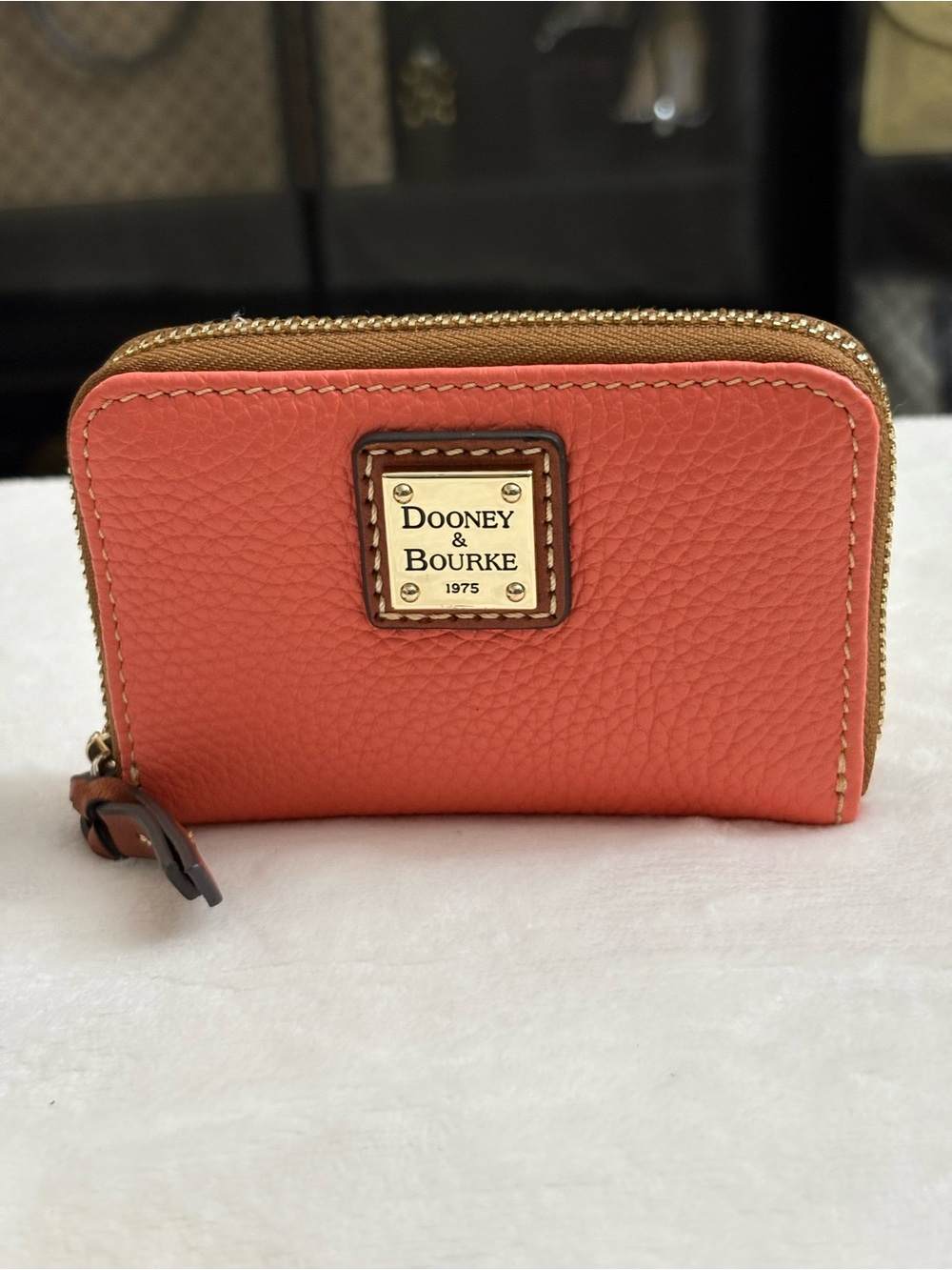 Dooney & Bourke Pebble Grain Large Zip Around Credit Card Case  Coral Color.